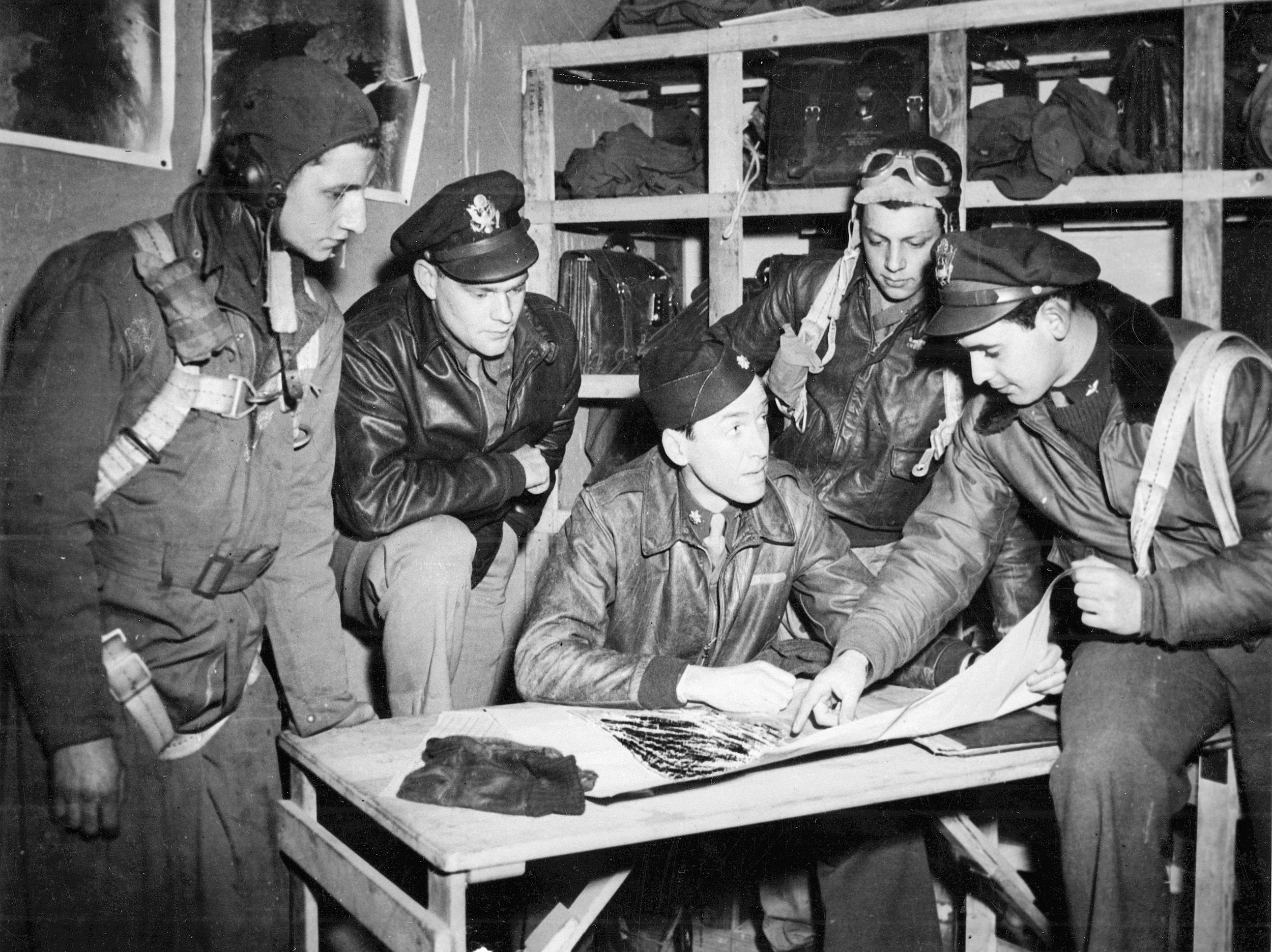 Major Jimmy Stuart briefs the fliers of the 453rd Bomb Group before a mission.