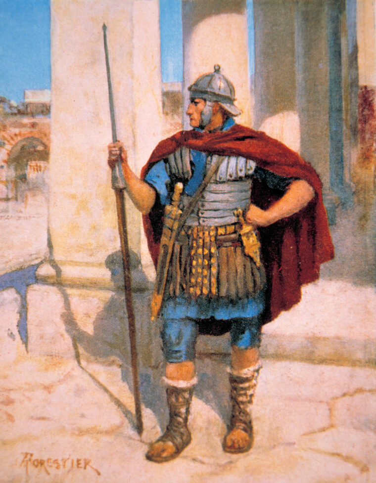 A Roman soldier with his armor and weapons. In his right hand he holds his pilum, or javelin. On his right is the gladius in its scabbard. On his left is a dagger in a scabbard.