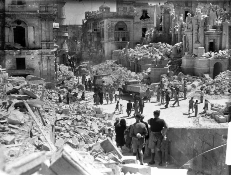 The damage from continual Axis air bombardment is evident in this image of Kingsway, now known as Republic Street, on the island of Malta. The city of Valletta was devastated in the spring of 1942, and this photo was taken during that terrible April. 