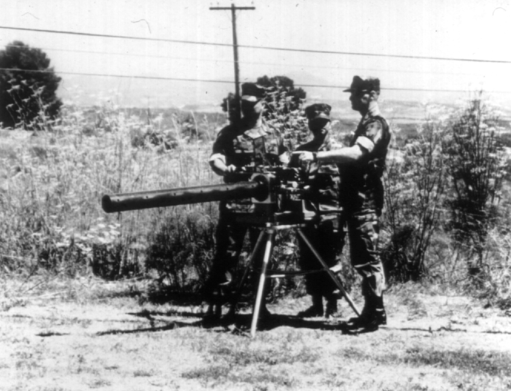 U. S. soldiers test a protype directional acoustic weapon.  It did not perform as hoped and has been discontinued.