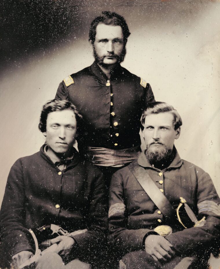 Captain Carlos Augustus Sperry, Company B, 23rd Ohio Volunteer Infantry poses with two enlisted men of the 23rd.