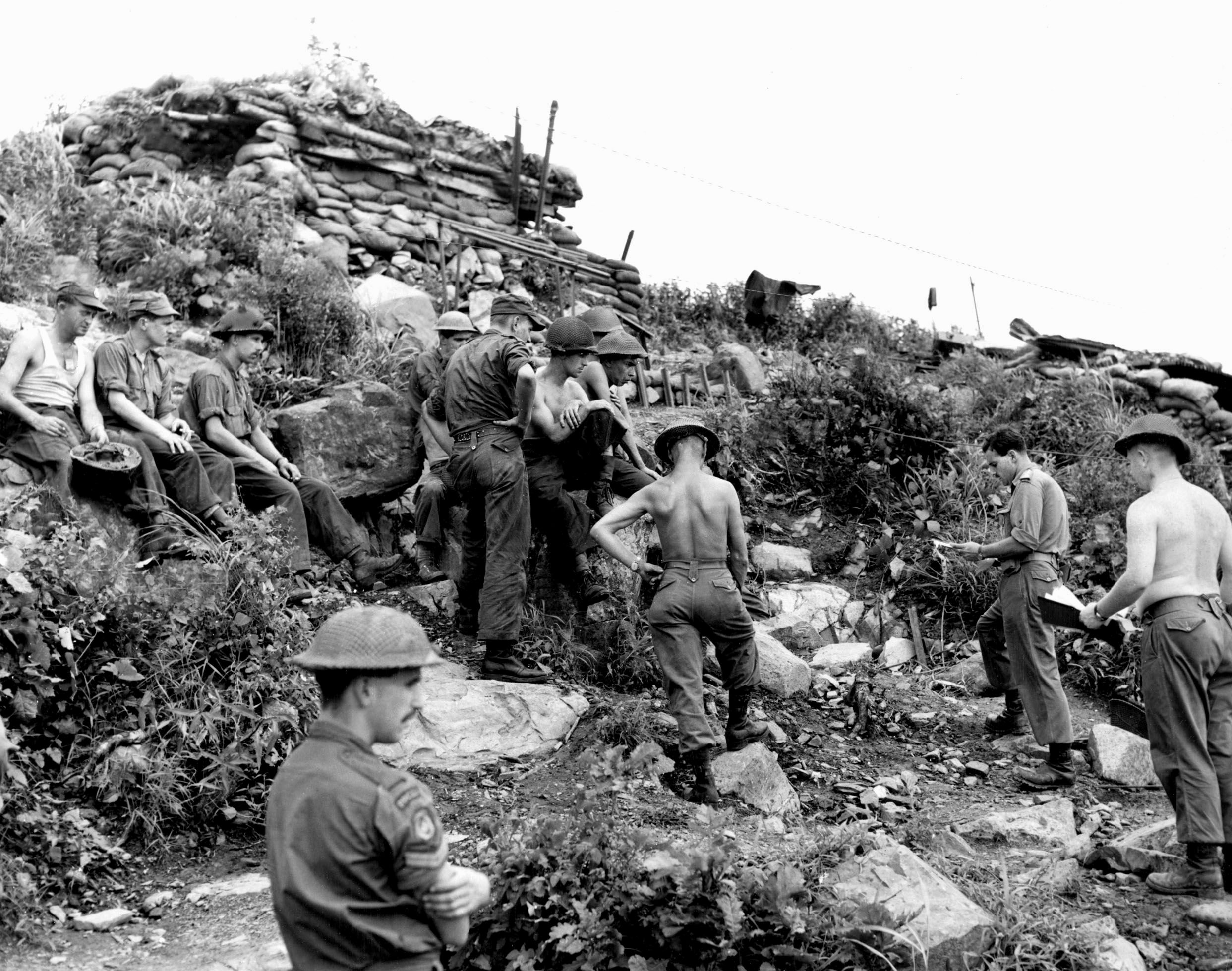 A Canadian defensive position on the side of Hill 355 lit up by flares. The “Royals” held out against Chinese forces for 33 hours in October 1952.