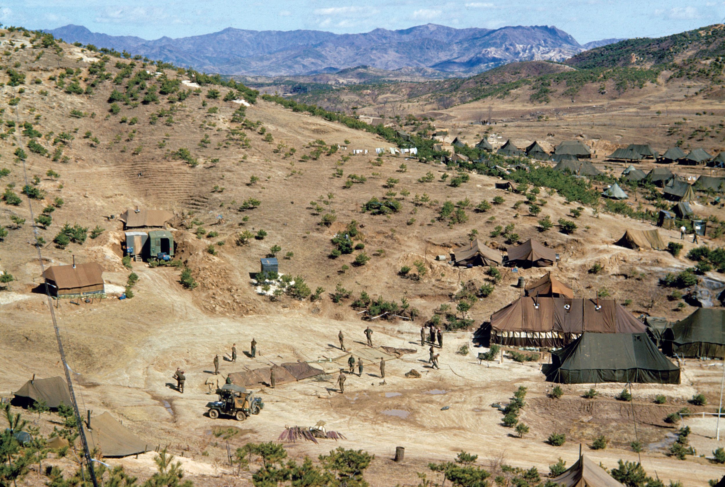 Royal Canadian Regiment rear echelon area north of Seoul, Korea, sheltered on the reverse slope of a hill overlooking the Nabu-ri River valley.