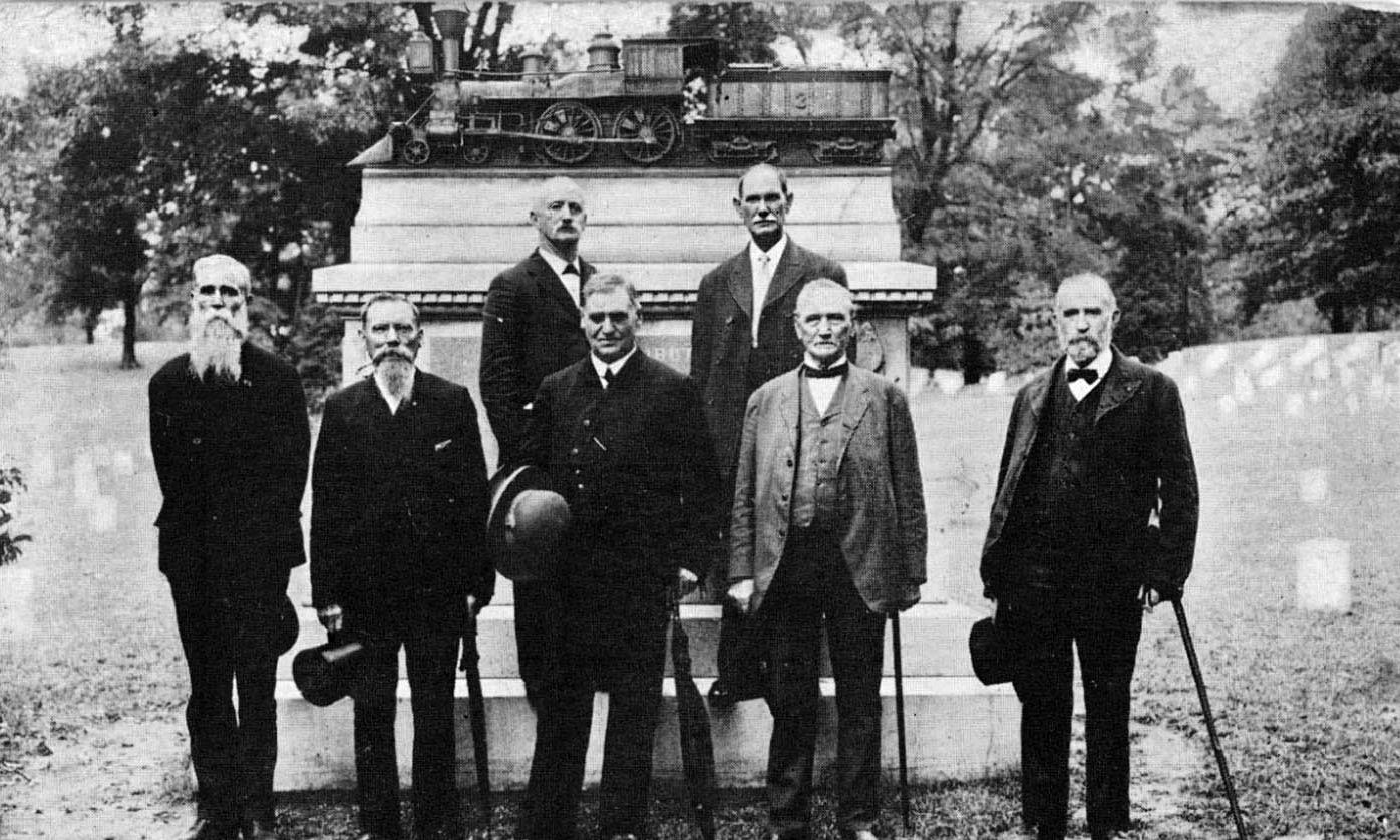 Surviving members of Andrews’ Raid in 1908—from left, Daniel A. Dorsey, John R. Porter, Jacob Parrott, William J. Knight, William Bensinger, John A. Wilson, Wilson W. Brown—in front of the monument built by the state of Ohio in 1890 at the Chattanooga National Cemetery. 