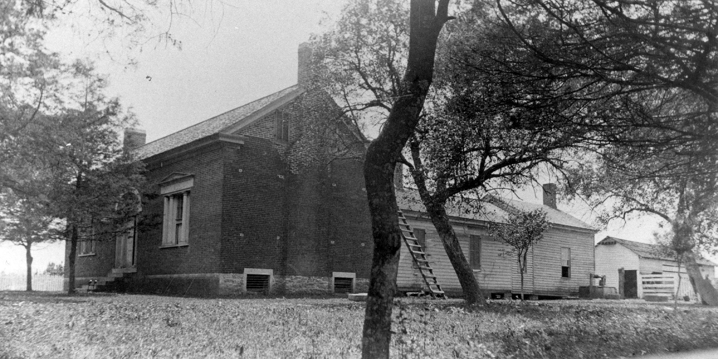 The Carter house in a post-war photograph.  At the time of the battle, it had stepped eaves, not straight ones made by the new brickwork evident at the upper reaches of the chimney.