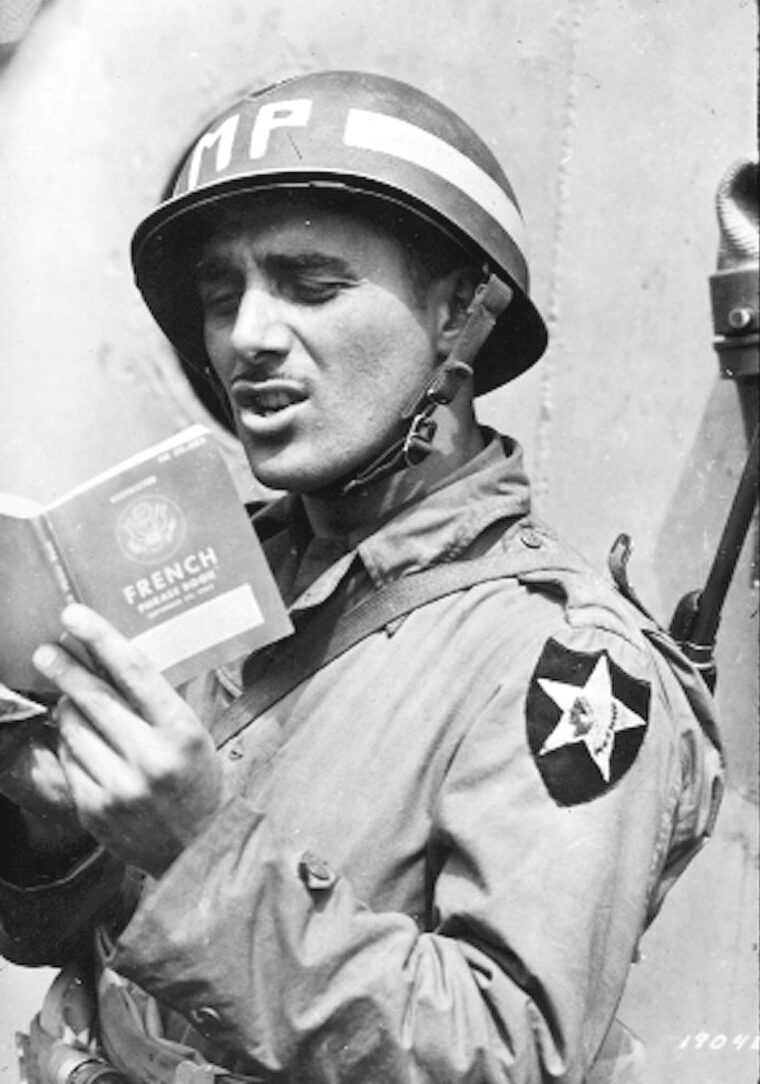 An MP with a 2nd Division patch, June 1944.