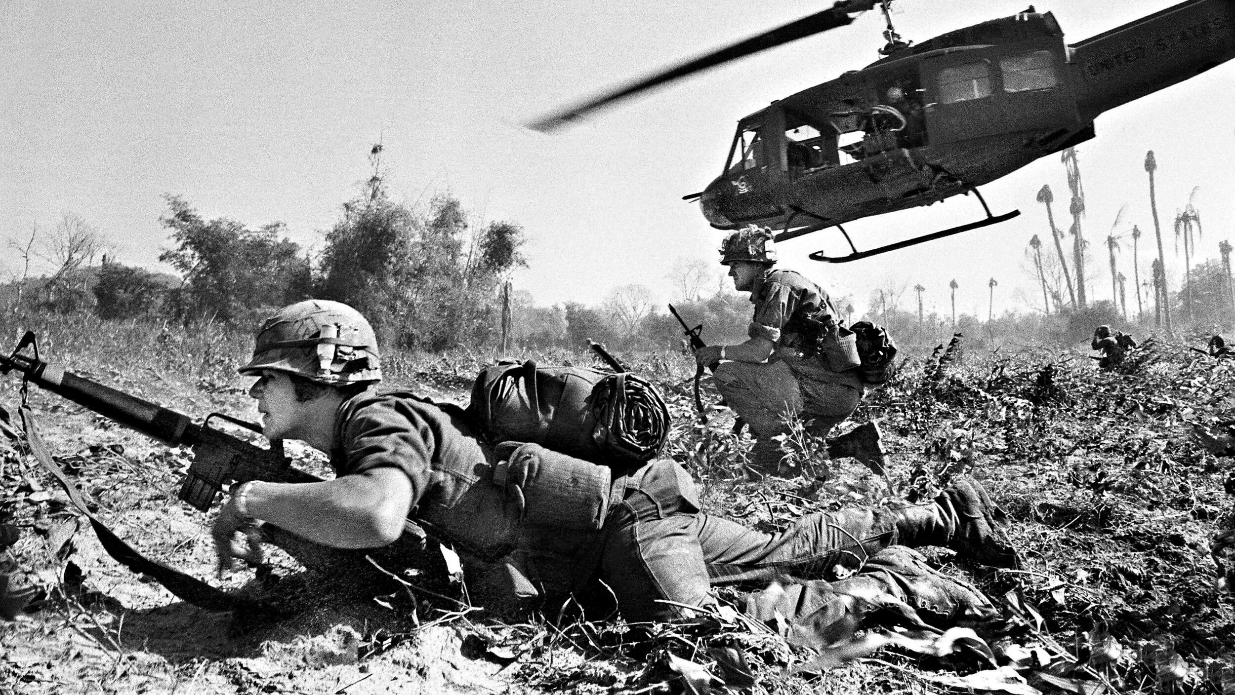 Medal of Honor recipient Major Bruce Crandall climbs skyward in his UH-1D helicopter after dropping off air cavalrymen at Landing Zone X-ray in the Ia Drang Valley in 1965.