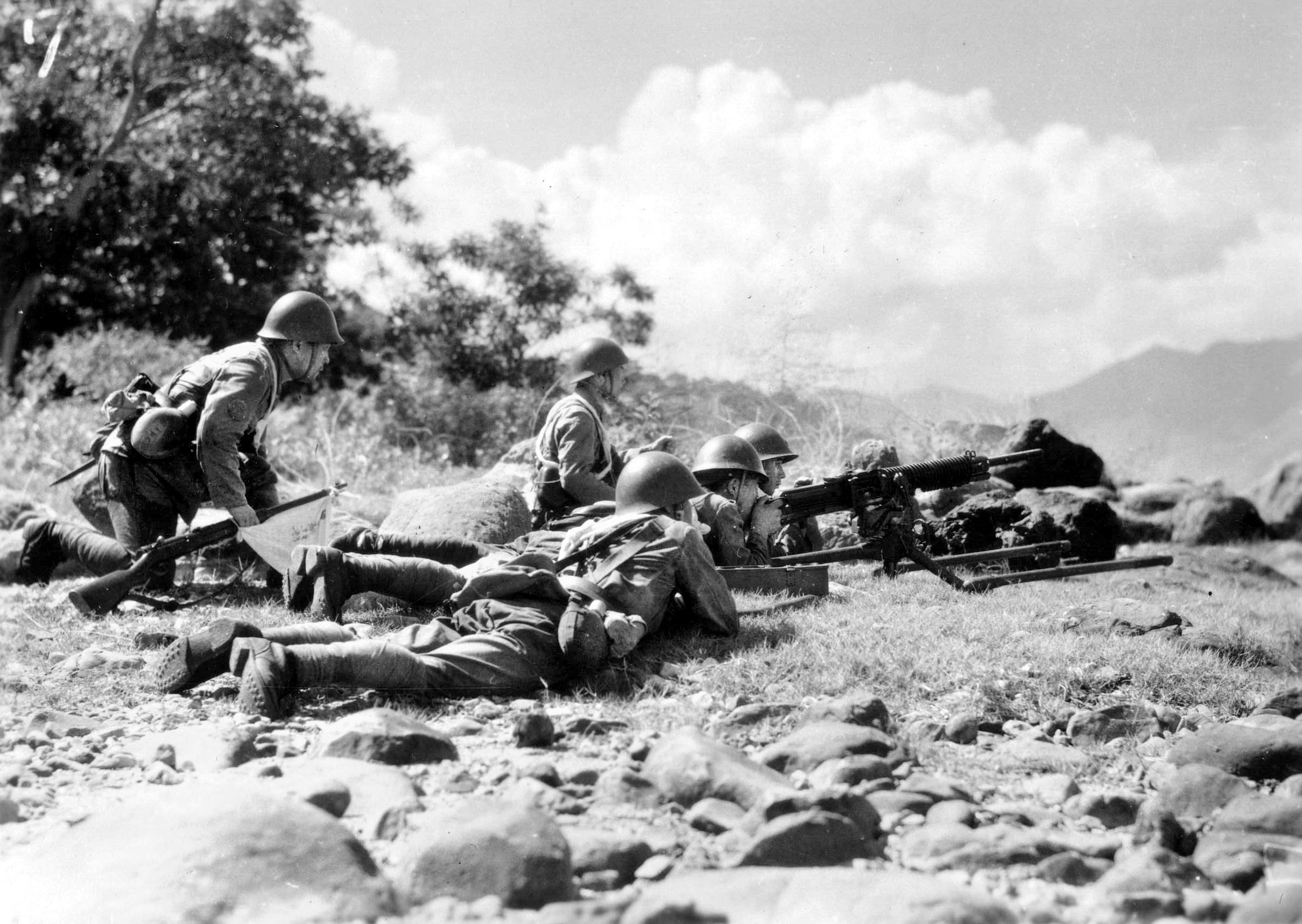 Japanese machine gunners pause during their pursuit of a retreating Chinese infantry unit. Moving with incredible speed, the Japanese conquered large amounts of Chinese territory in a relatively short period of time.