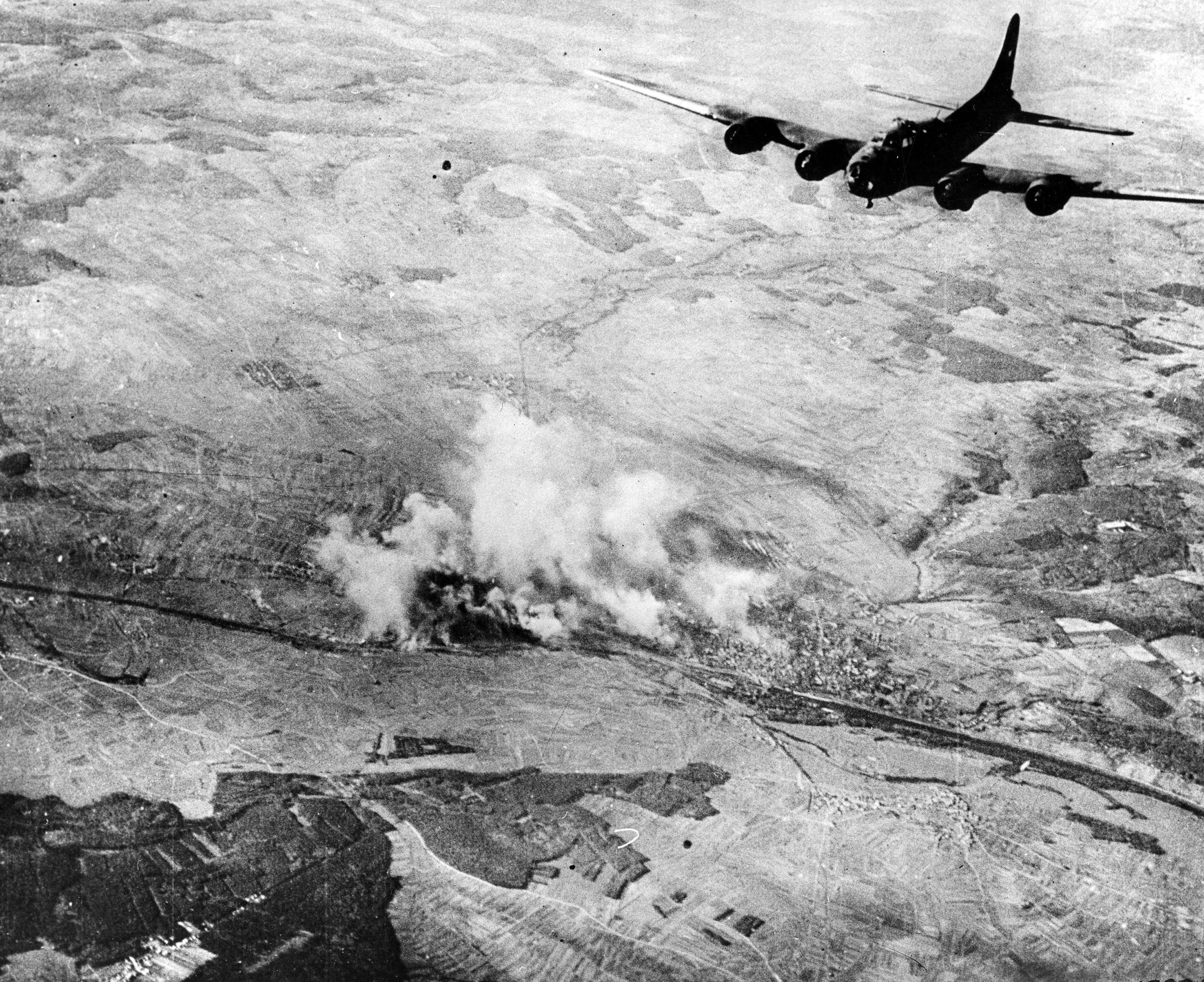 A B-17 Flying Fortress returns from a raid on ball bearing factories at Schweinfurt, Germany, in October 1943. It was a costly attack on a heavily defended target, and Les Amundson's crew joined the 384th Heavy Bombardment Group, which sustained serious losses over Schweinfurt, on the same day as the fateful raid.
