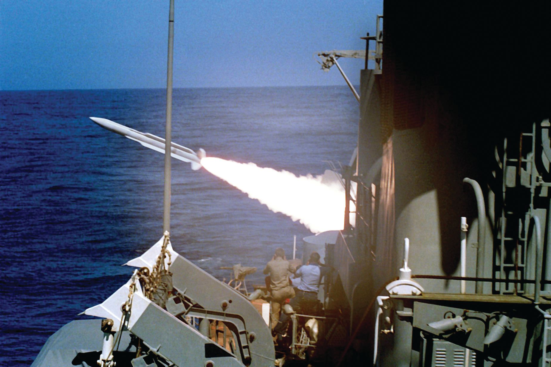 A Navy guided-missile destroyer fires a RIM-66 Standard surface-to-air missile from a Mark-13 launcher during Operation Praying Mantis. 