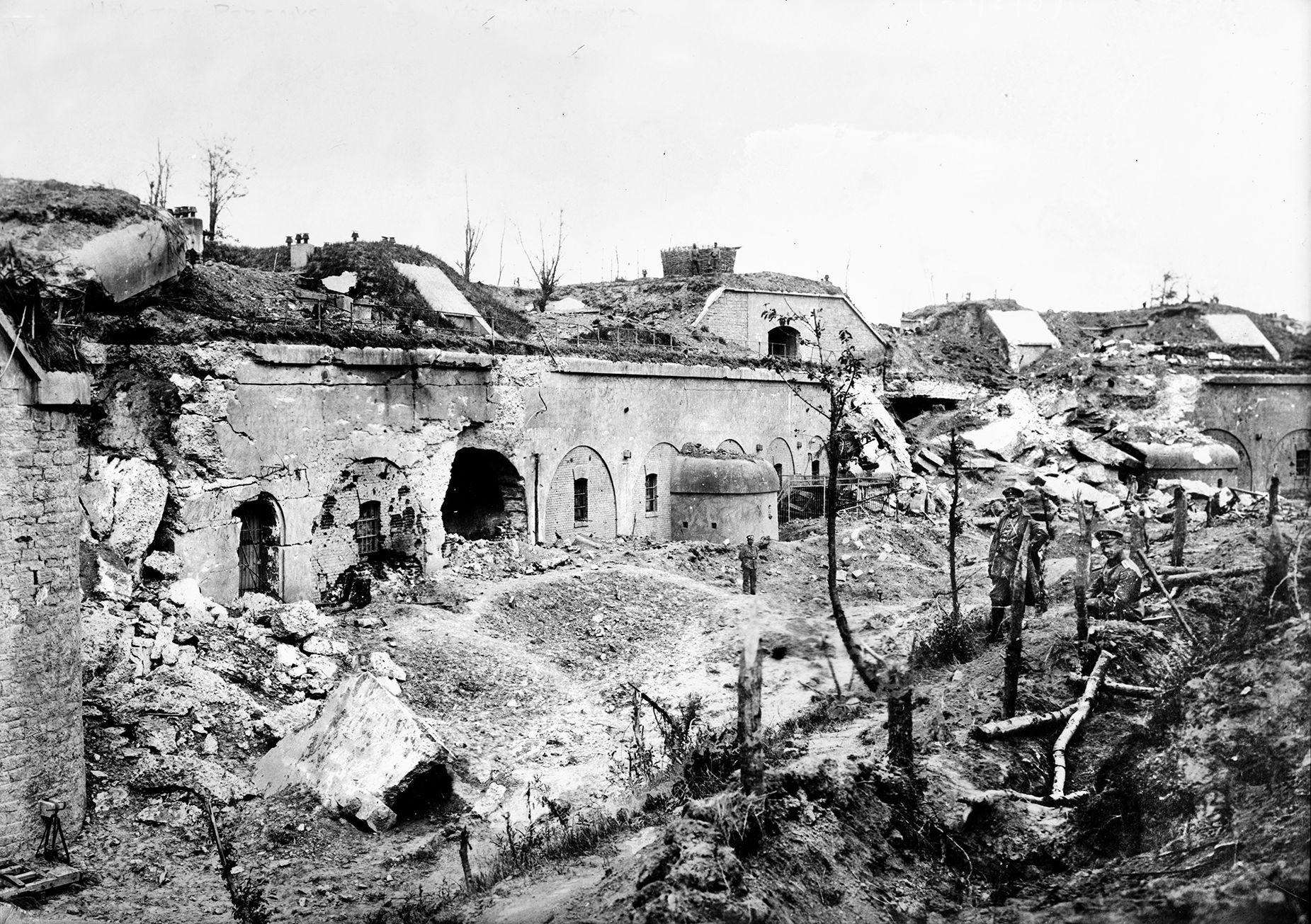 Russian soldiers, right, survey the destruction of one the outer defensive forts of the Ring Fortress of Przemyśl. The Russians only held the fortress until June 3, 1915, when it was retaken during a renewed Austro-Hungarian offensive.