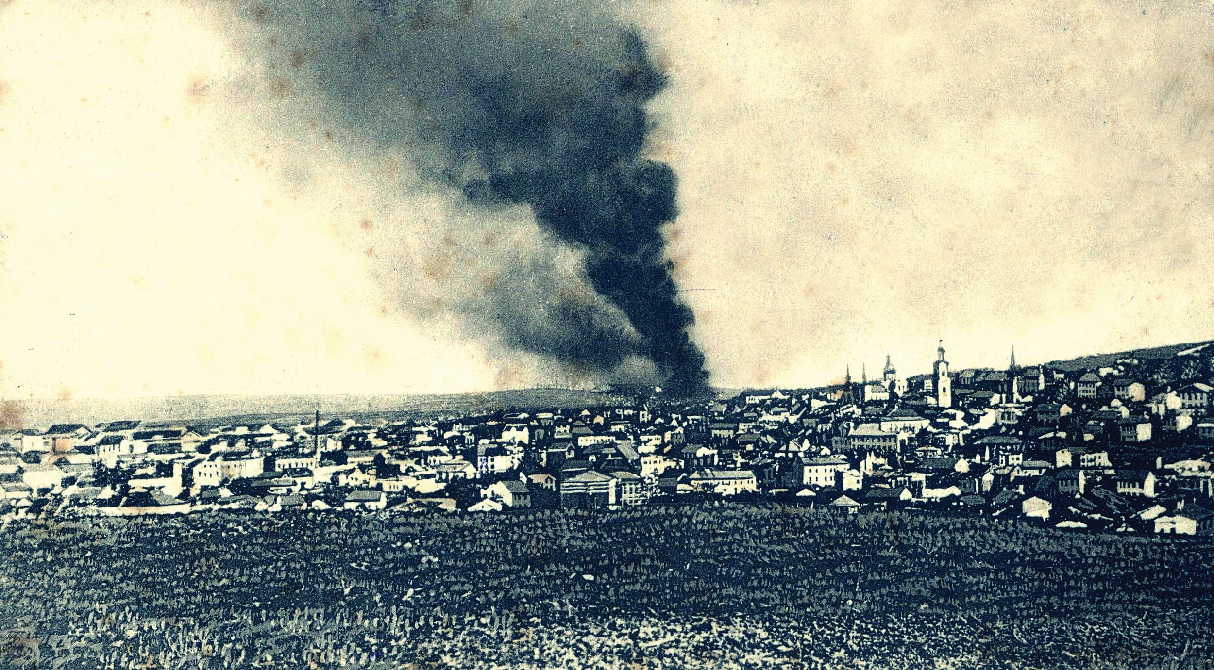 This period post card shows smoke rising from an ammunition magazine in the fortress city of Przemyśl during the 1914-1915 Russian siege. The five-month siege, the longest of the Great War, lasted from November to March, when the Austro-Hungarian defenders ran out of food. They blew up the outer forts and their ammunition before surrendering on March 22, 1915.
