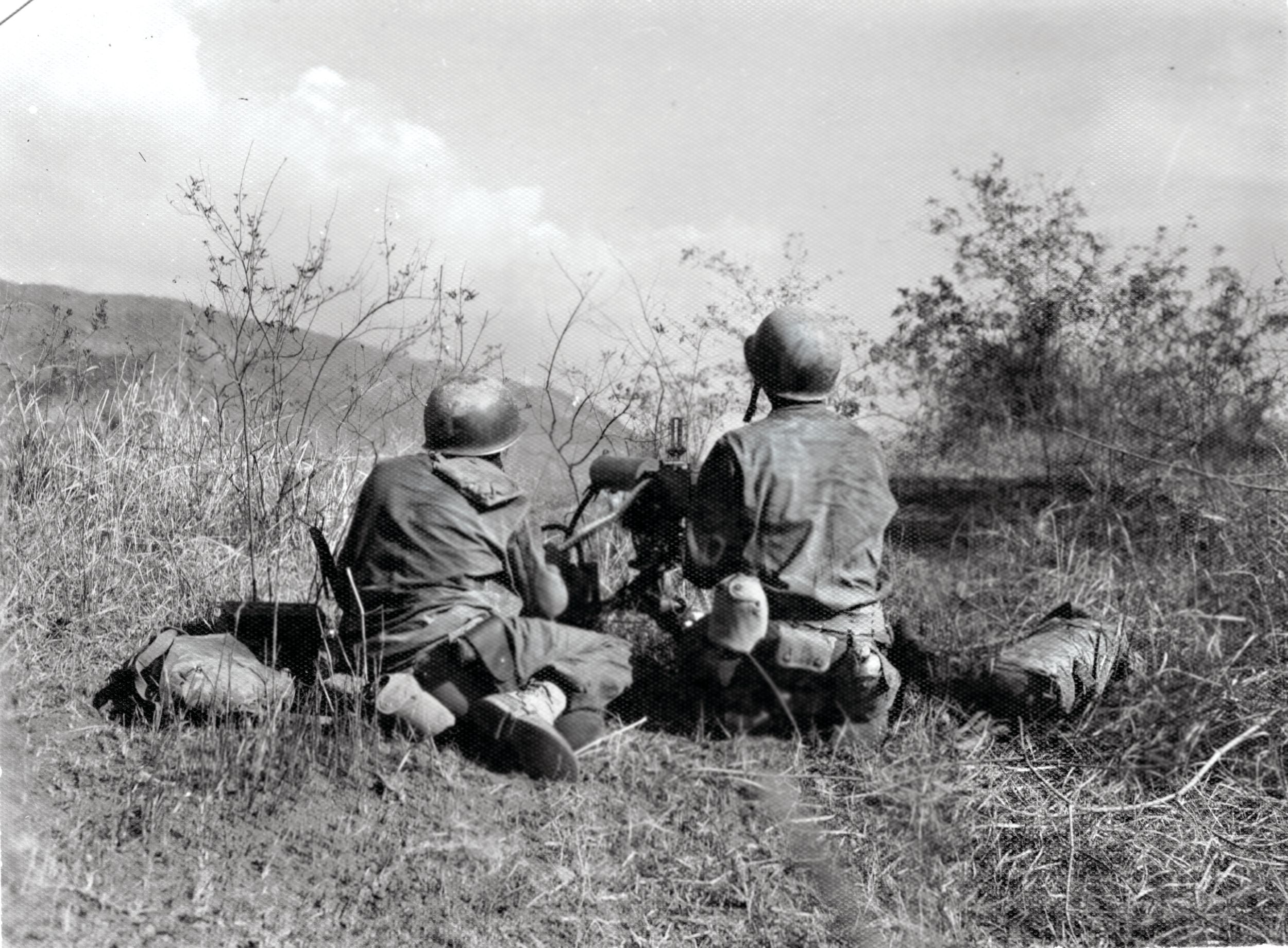 Soldiers with a .30 caliber water cooled machine gun near Damortis on Luzon. On January 9, 1945, more than 175,000 troops landed on Luzon’s east coast as part of Operation MIKE aimed at liberating the island from Japanese occupation.