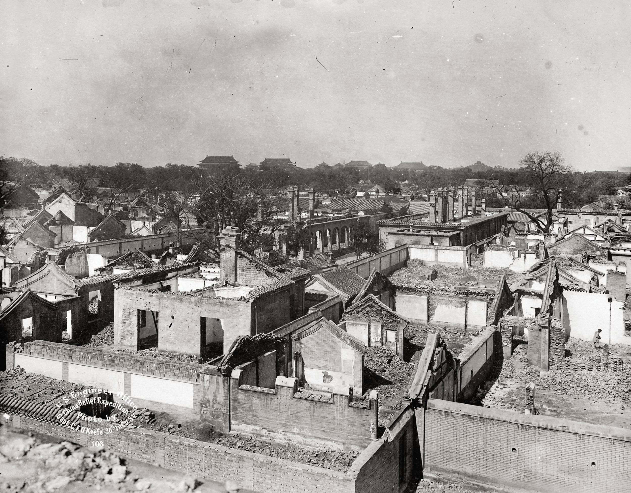 This photo was taken circa 1900 looking north-west from Fort Myer on the Tartar Wall bordering the United States diplomatic legation in Peking (modern Beijing) China. Foreign diplomats, missionaries, soldiers and Chinese Christians were surrounded under siege for 55 days during the Boxer Rebellion.