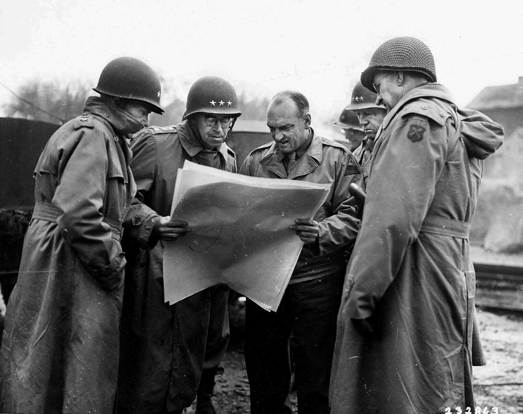 From left, generals Leven Allen, Omar Bradley, John Wood, George Patton, and Manton Eddy, consult a situation map near Metz, France, in November 1944. Despite his success in France, Wood was relieved of command by Patton on December 3, 1944, never to return to the war—something for which he blamed Eddy, his commander, with whom he’d never had a good relationship.