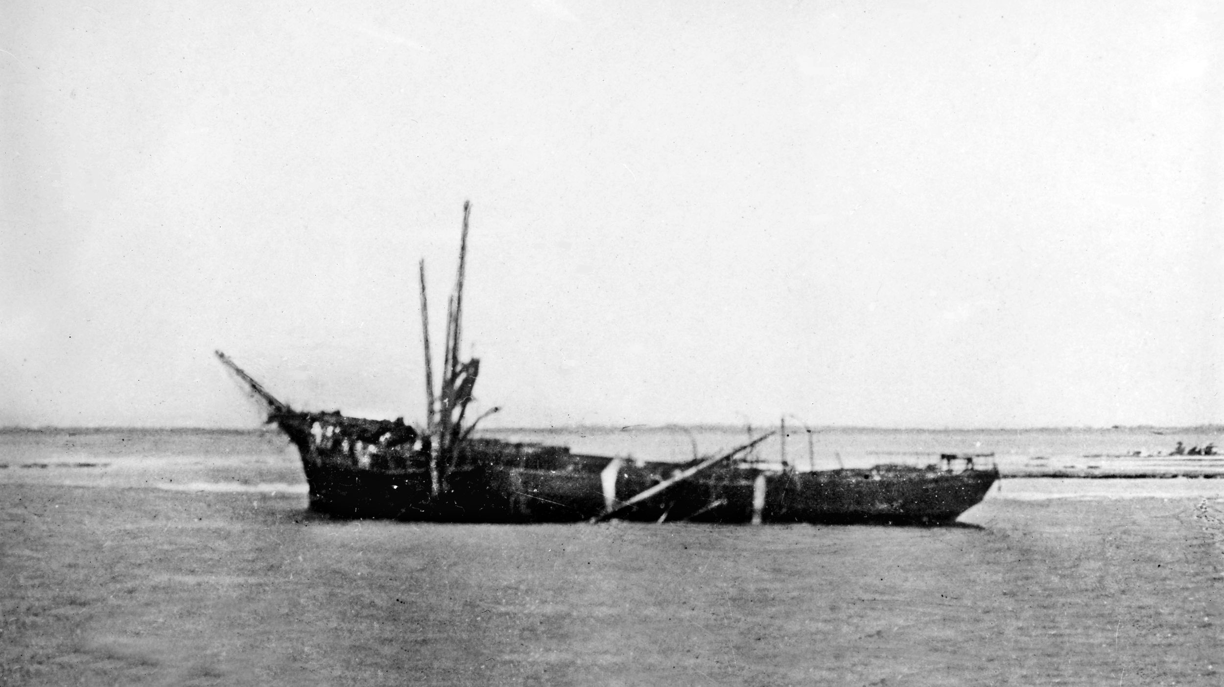 The hulk of the sailing commerce raider SMS Seeadler after it was wrecked on a reef in a storm on August 2, 1917, at the Mopelia atoll in the South Pacific’s Society Islands, after stopping to replenish supplies. It was then burned by her crew.
