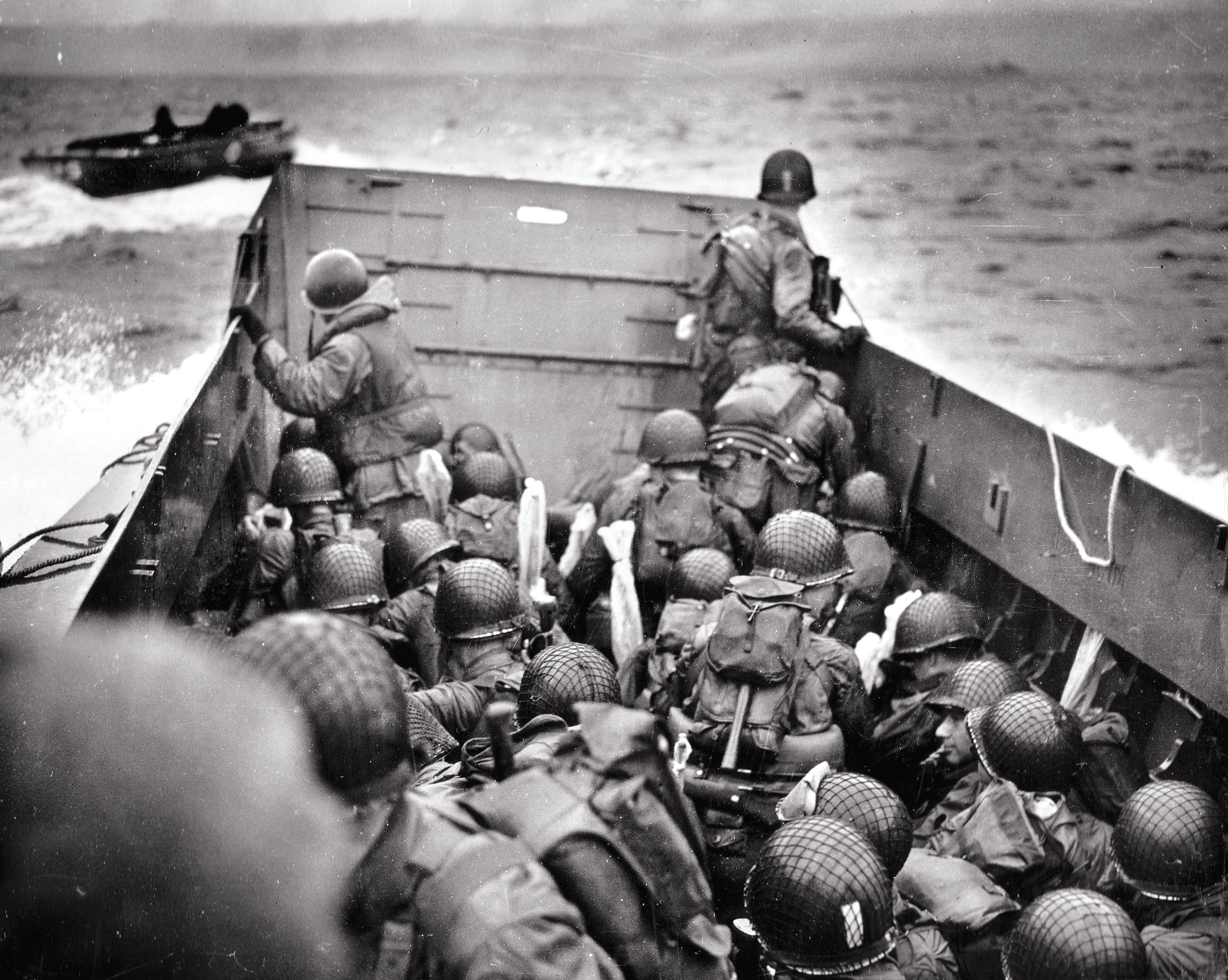 Company A, 116th Infantry Regiment, 29th Infantry Division in a landing craft heading for Omaha Beach in the first wave of the D-Day assault on Normandy.