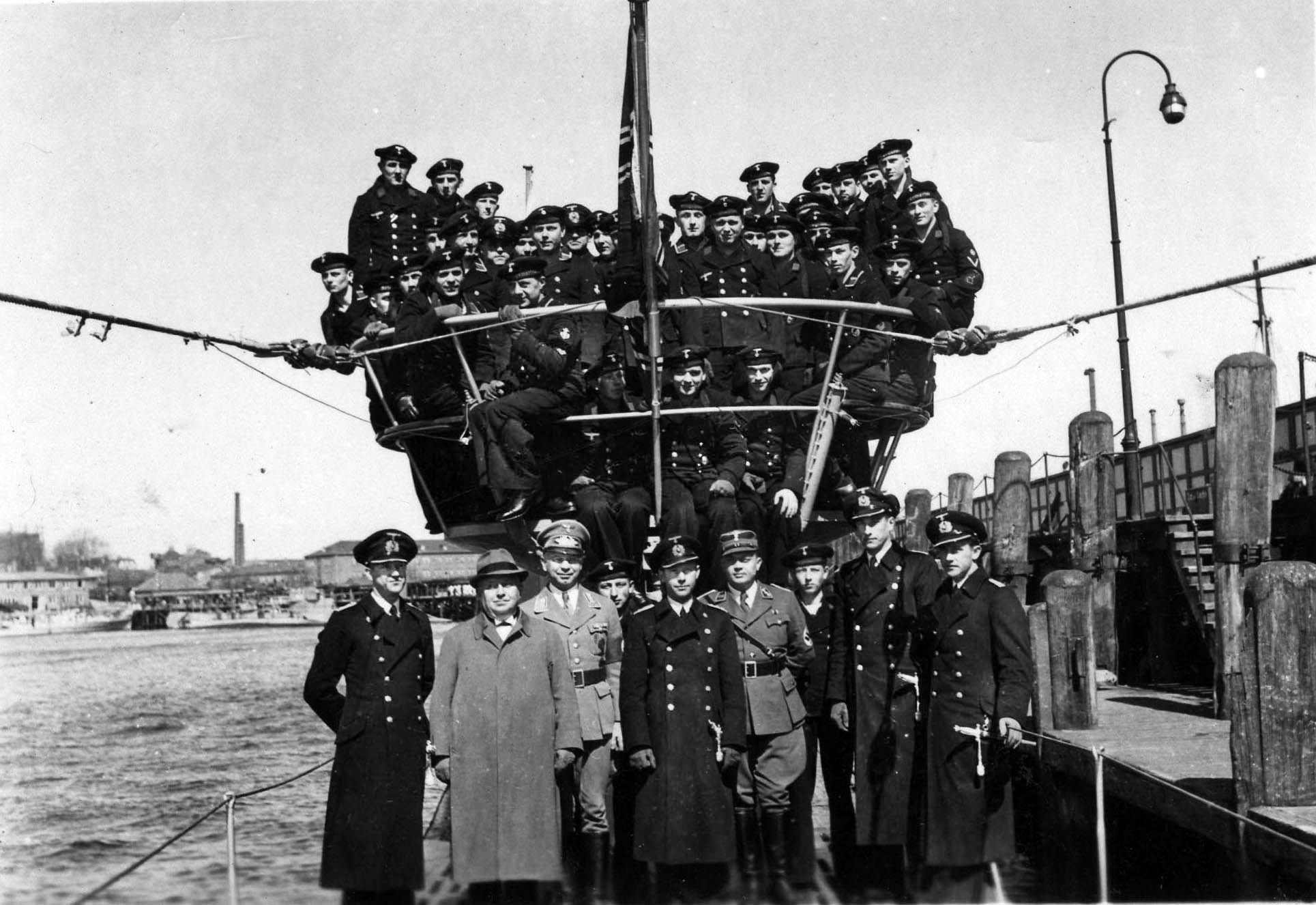 Photograph of the commissioning of the U-451. On the bottom row are Kapitäleutnant Eberhard Hoffmann, center, and Oberleutnant zur See Walter Köhler, far right.