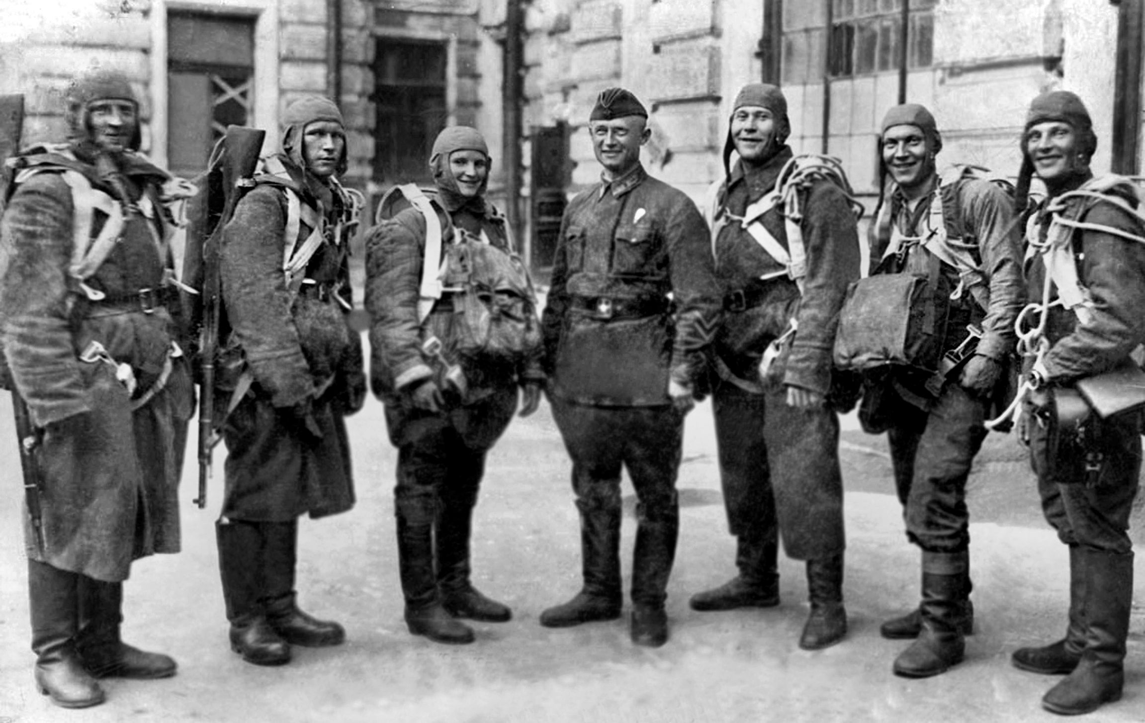 A group of Soviet paratroopers photographed some time in 1941. On January 27, 1942, the 4th Airborne Corps began dropping near the village of Ozerechnya. Due to a shortage of transport planes, it took many trips to make the drop. With little fighter cover for the Russians, German fighters shot down many transport planes and seven Tupolev TB-3s were destroyed by airfield bombing. The attacks and the worsening weather forced the Soviets to suspend the rest of the drops. 