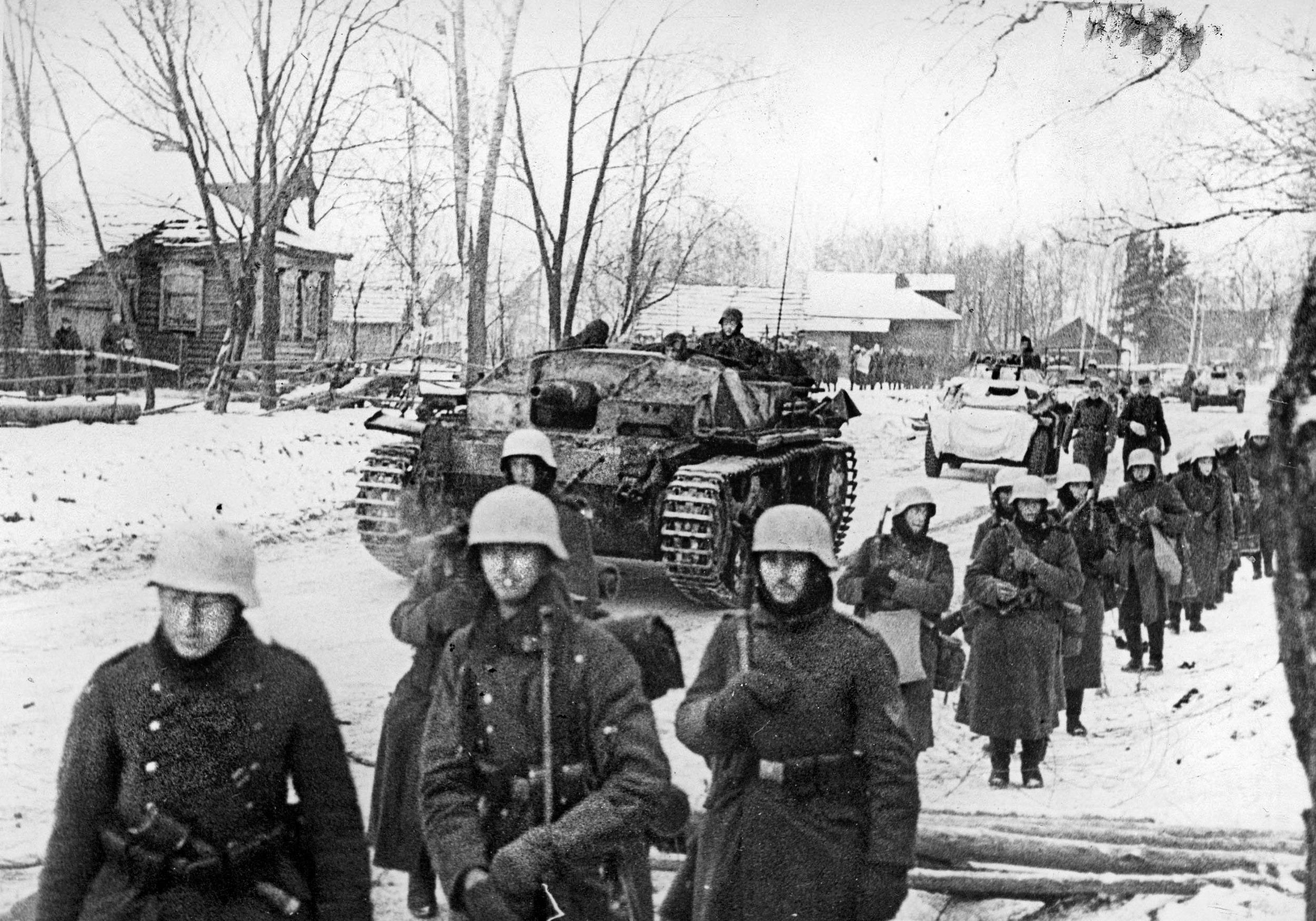A StuG III and other vehicles accompany German infantry on the march to Moscow. Stopped within sight of the Russian Capital in early December of 1941, the Soviet counterattack would push the Germans back some 200 miles by the end of the month. Though this effort left the Red Army spent, Stalin insisted that they try to encircle and destroy the retreating enemy. The Vyazma Airborne Operation—dropping paratroopers behind German lines was meant to accomplish this and, though it had some initial success, the operation suffered more than a few setbacks.