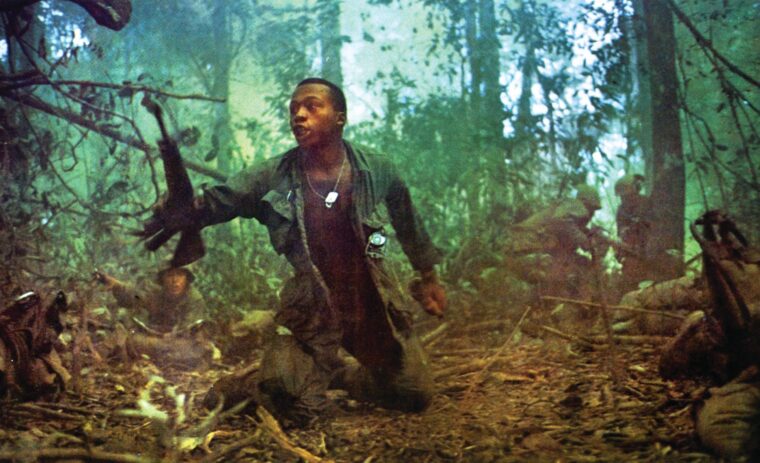 Capturing the raw emotion and brutality of war, this iconic image of Paratrooper Wayne T. Winters from the 173rd Airborne Brigade calling for a medic on Hill 882 southwest of Dak To, Vietnam, was taken by Catherine Leroy, a French photojournalist embedded with the Sky Soldiers.