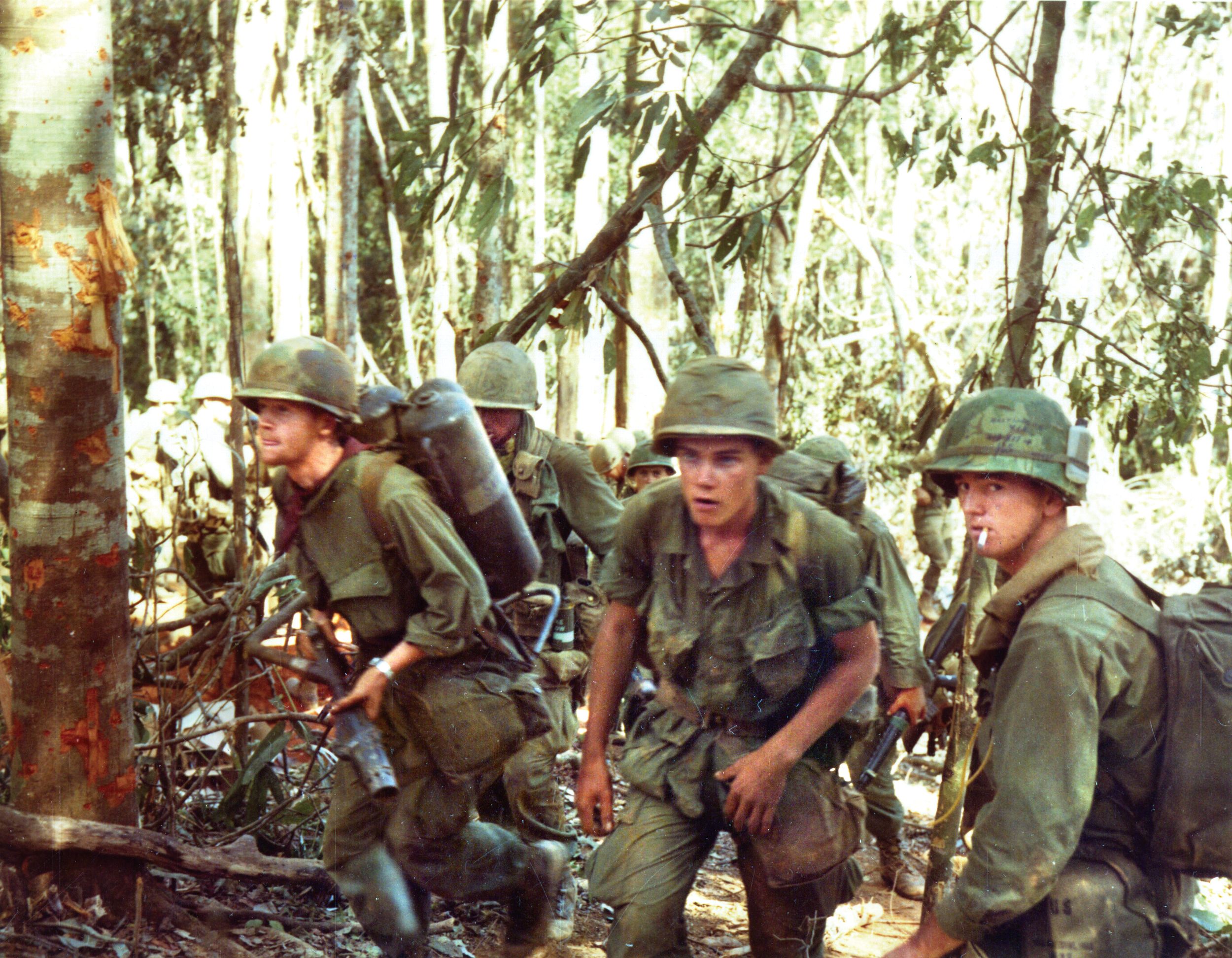 Sky Soldiers of the 173rd Airborne Brigade move up a hill into position near Dak To, a district in the Central Highlands of Vietnam near the tri-border area with Laos and Cambodia that was the site of intense fighting during the war.