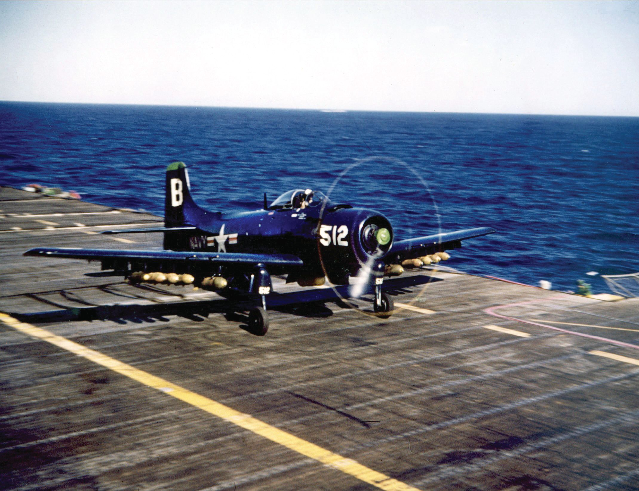 A Navy Douglas AD-4 Skyraider from attack squadron VA-195, the “Dambusters,” takes off from the deck of the carrier USS Princeton during the Korean War. Formerly nicknamed the “Tigers,” the squad changed its name after their successful raid on the Hwachon Dam on May 1, 1951.
