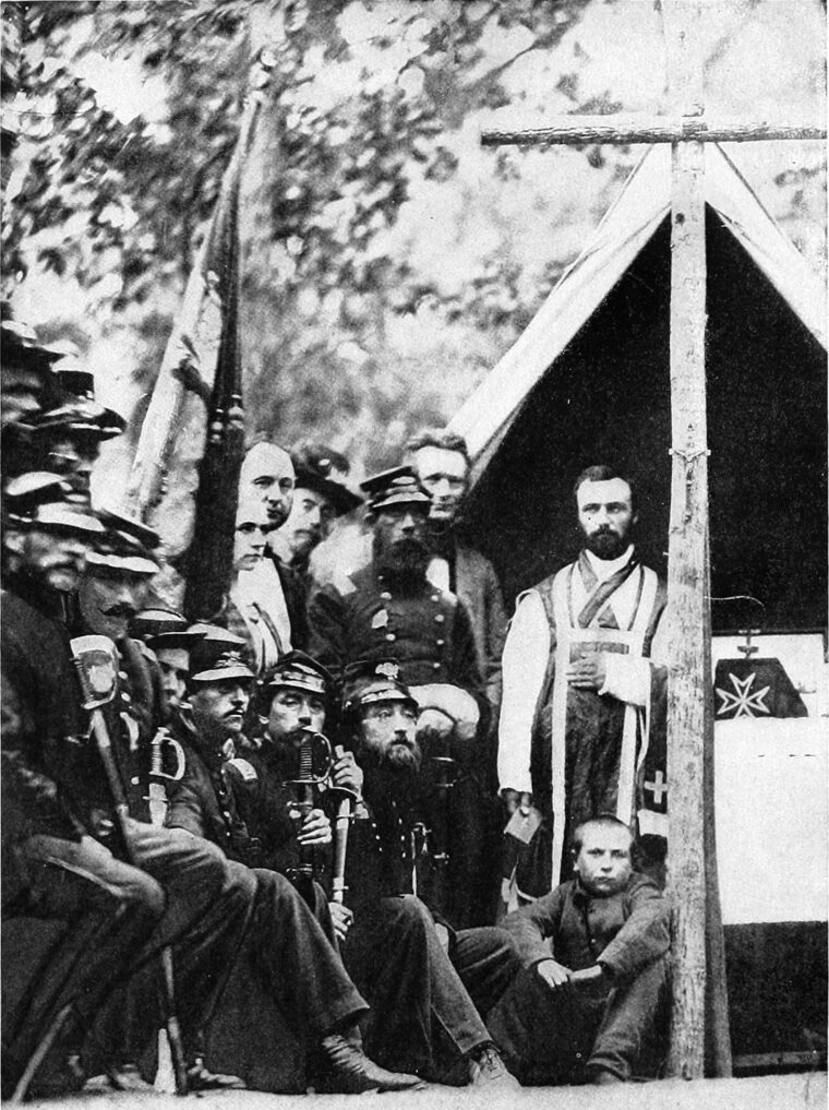 Father William Corby—chaplain for the 88th New York Infantry, one of the five original regiments in the “Irish Brigade”—pauses before celebrating mass at Camp Cass, Virginia, in 1861with the Ninth Massachusetts, composed mainly of Irish volunteers from the Boston area. Corby would become famous for giving general absolution to the Irish Brigade on the second day of the Battle of Gettysburg.