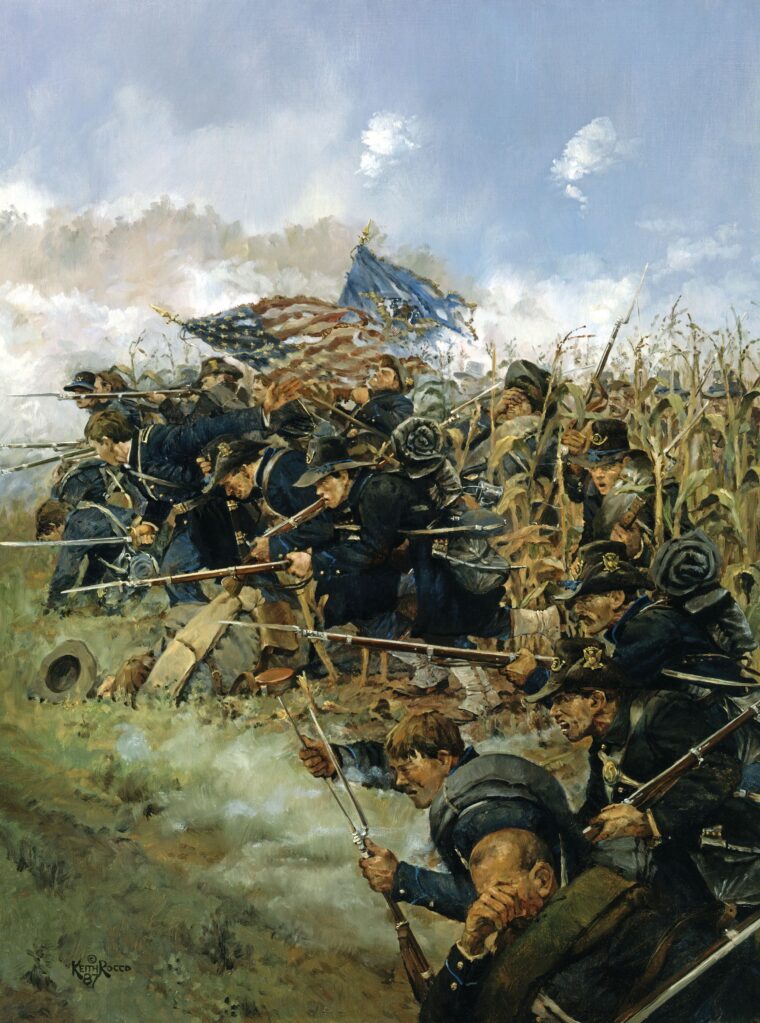 Men from Brigadier Geneneral John Gibbon’s hard-fighting Iron Brigade emerge from Miller’s Cornfield into a hailstorm of Confederate bullets in the morning hours of September 17, 1862, at Antietam. Painting by Keith Rocco.