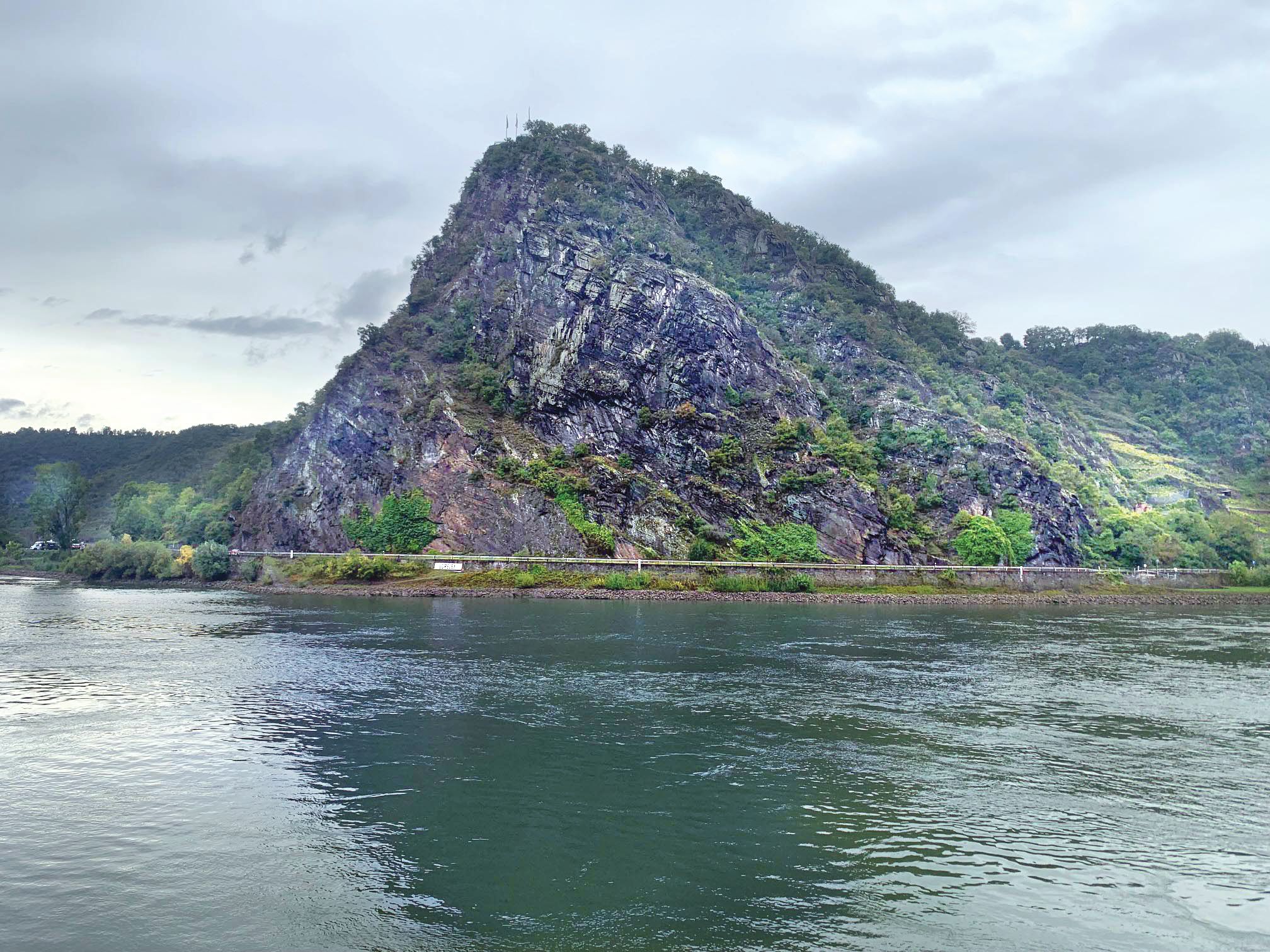 The Lorelei Rock overlooking a bend in the Rhine River. Legend held that a scorned lover threw herself from its summit and became a ghostly siren who lured sailors to their doom. This is where Maj. Gen. Troy Middleton wanted to cross.