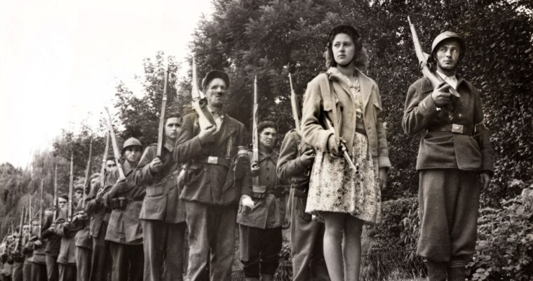 French Maquis resistance fighters during the liberation of France (1944–1945). Operating from rural strongholds, these guerrillas played a vital role in sabotaging German lines of communication and aiding the Allied advance.