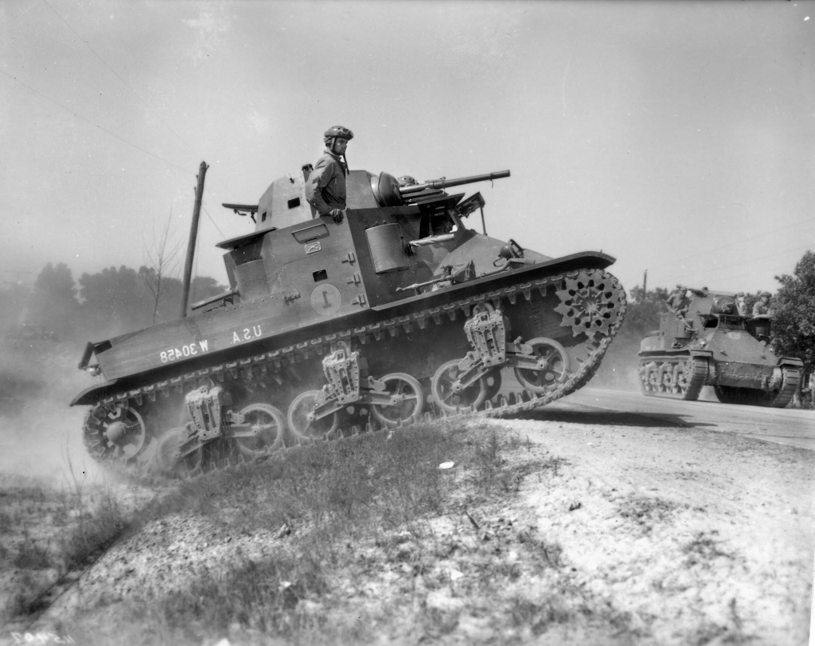 John Sanford Baird was a gunner in an M2A3 “Mae West” light tank, and his unit mobilized as quickly as possible on the morning of December 7, 1941.