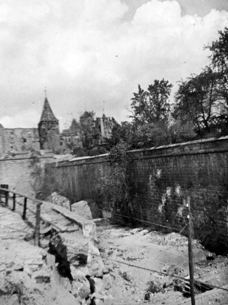The ruins of Nuremberg’s medieval dry moat in April 1945. The fortifications, once a source of civic pride, were unable to withstand the modern machinery of war as nearly 90 percent of the historic city center was destroyed in the final drive of the U.S. Seventh Army.