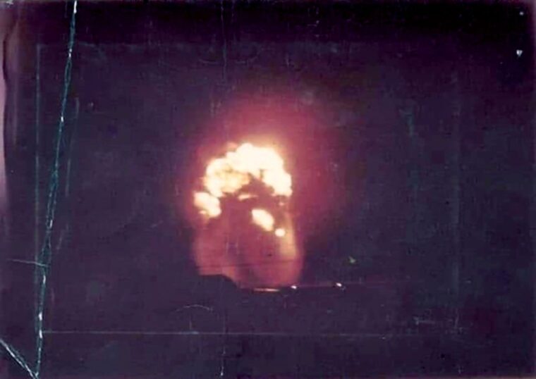 A 122mm rocket strikes an ammunition dump near Landing Zone Bayonet at the Chu Lai Air Base on January 31, 1968, during the Tet Offensive. “To us, it was a nuclear bomb, and the fire was about to engulf us,” recalled Len Corsetti of the 198th Infantry Brigade. “I accepted my demise. The fireball turned black, and the expansion slowed.”