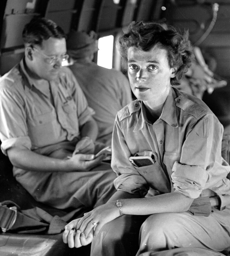 New York Herald Tribune war correspondent Marguerite Higgins on a U.S. military transport plane during the Korean War. She would become the first woman to win the Pulitzer Prize for International Reporting in 1951 for her ground-level coverage of the conflict.