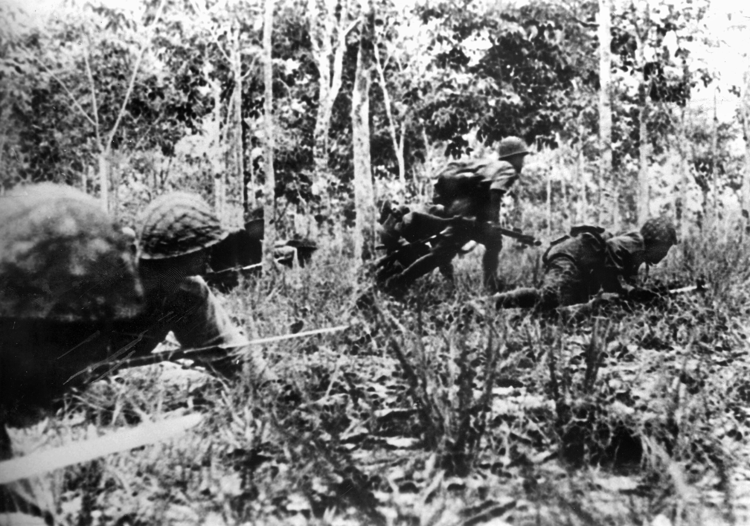 Japanese infantrymen with fixed bayonets creep through dense jungle as they advance on Kohima in the spring of 1944. Conceived as the opening thrust of Operation U-Go, the invasion tasked Lt. Gen. Renya Mutaguchi’s 15th Army with overrunning vital British supply depots along the Assam borderland, intending to break Allied resistance and spark a grand march into the heart of India.