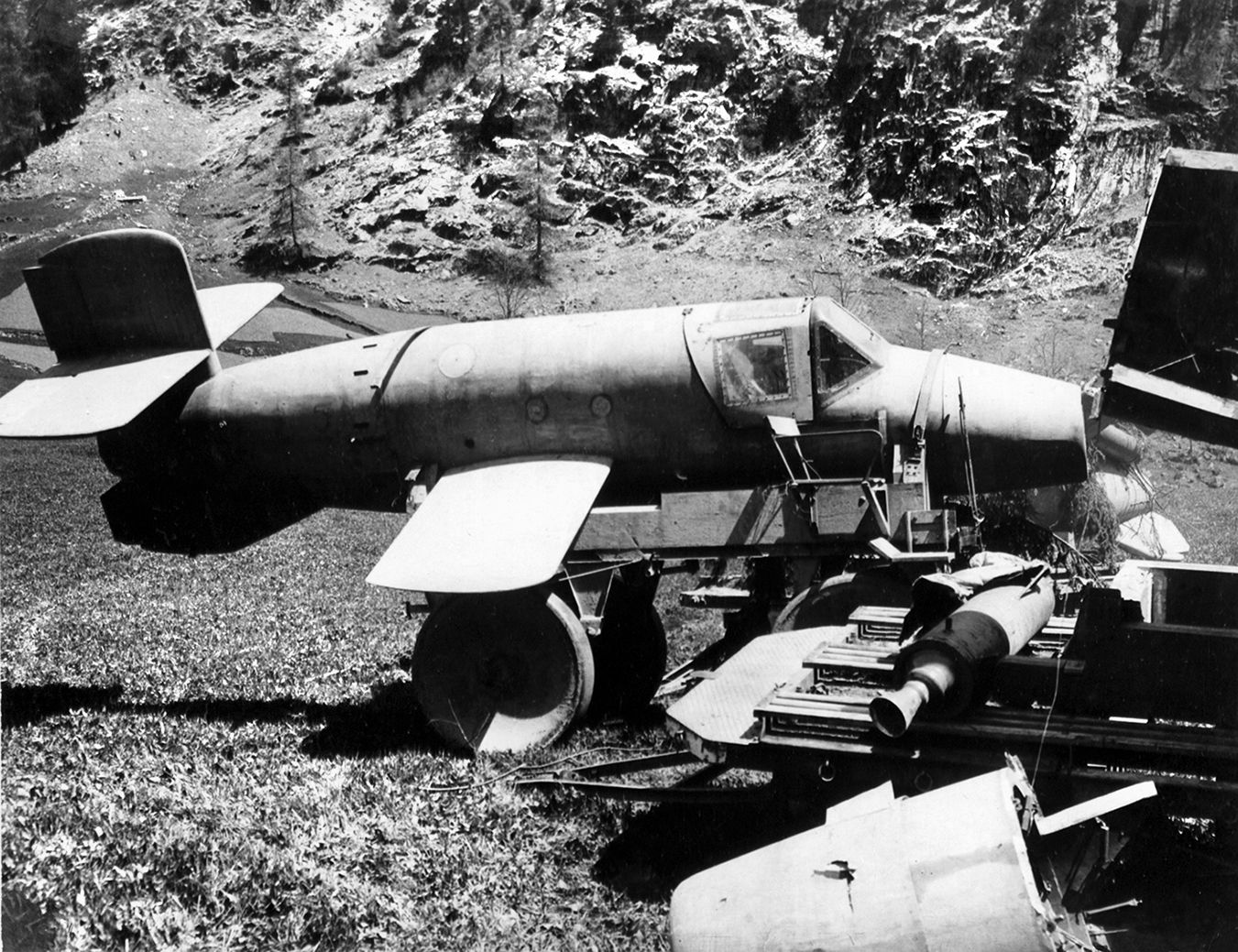 Allied troops inspect unfinished Ba 349 Natters abandoned in a field near St. Leonhard, Austria, in May 1945.