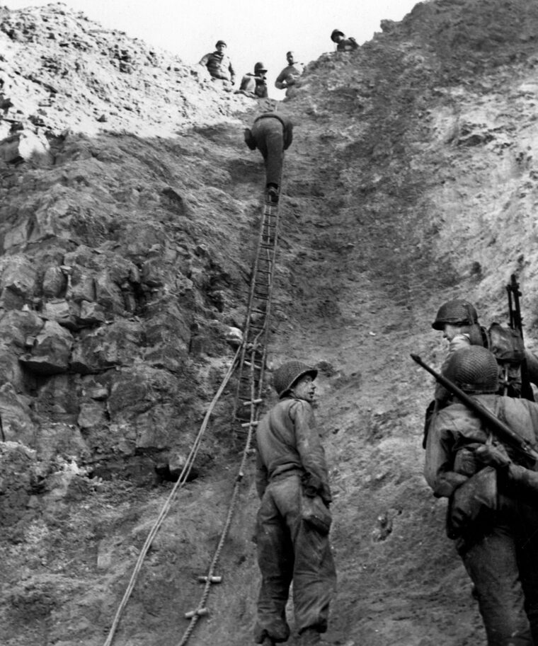 This photo, taken within a day or two of the assault, shows the daunting 100-foot cliffs of Pointe du Hoc. In the immediate aftermath of the climb, Rangers used ropes and extension ladders borrowed from London’s fire brigade to haul up medical supplies, food, and ammunition.
