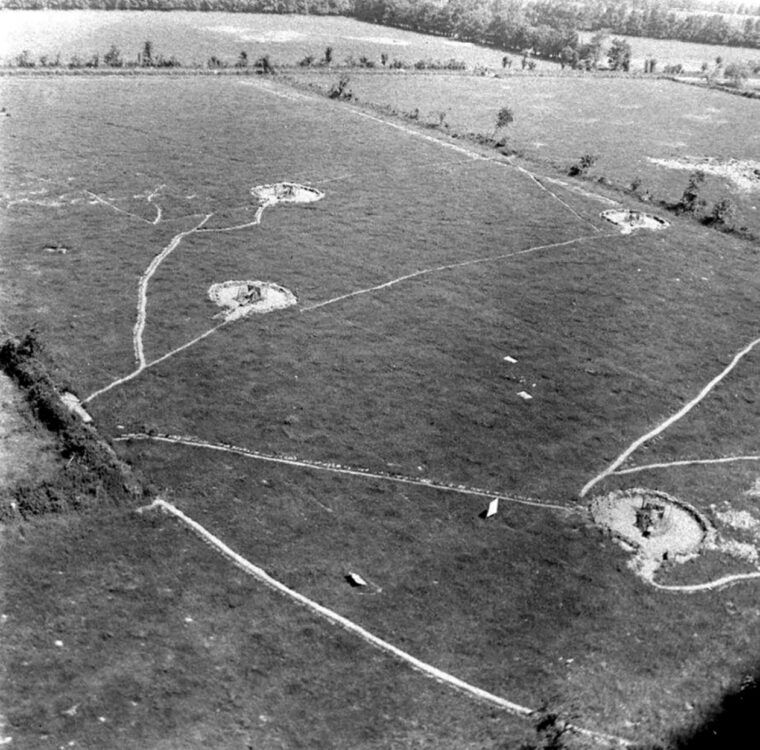 This aerial view of the area around Maisy shows the open artillery positions just north of German strongpoints Widerstandsnest 83 and Widerstandsnest 84. Unlike the concrete casemates nearby, this field position would have been clearly visible to Allied reconnaissance aircraft before the invasion.