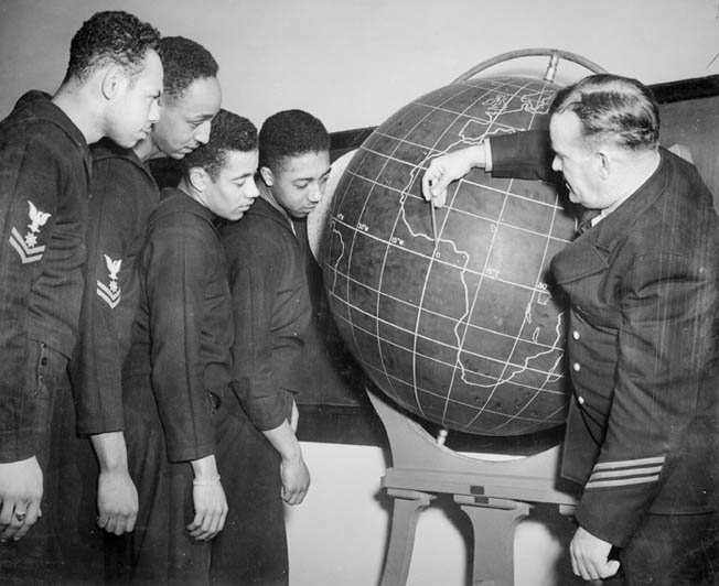 The Mason’s skipper, Lt. Cmdr. William M. Blackford, USNR, poses with Charles Divers (far left) and three shipmates at the Norfolk Naval Training Station, January 3, 1944. 