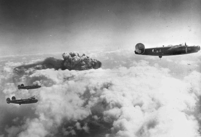 A large cloud of dark smoke in the distance indicates that the Fifteenth Air Force’s attack on the German-controlled oil-production facilities at Ploesti, Romania, May 1944, is successful. Ploesti was bombed 22 times by the Fifteenth Air Force.