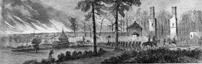 With Atlanta in flames behind them, Sherman’s XIV and XX Corps march south. Each man carried a musket, 40 rounds of ammunition, a tin cup, and a haversack. The rest they would scavenge along the way.