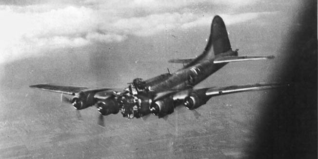 This B-17, nicknamed Mizpah, took a direct hit from German flak during a raid in July 1944. The enemy shell smashed the bomber’s nose section and killed two crewmen instantly. The pilot of the stricken bomber was able to hold the plane level long enough for the remaining crewmen to bail out. The plane crashed in Hungary and the survivors were captured. 