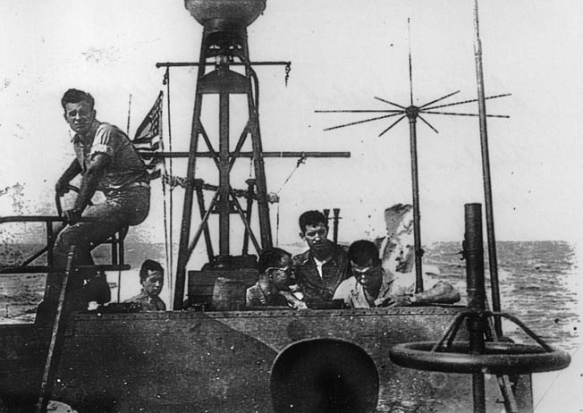 Lieutenant (jg) Hank Blake (right front, with head lowered) was a champion wrestler in college. The U.S. Navy actively searched for such tough, competitive men to skipper PT boats in World War II. Blake died in December 2012.Lieutenant (jg) Hank Blake (right front, with head lowered) was a champion wrestler in college. The U.S. Navy actively searched for such tough, competitive men to skipper PT boats in World War II. Blake died in December 2012.