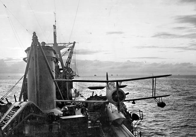 One of Chicago’s catapult-launched Curtiss SOC “Seagull” observation floatplanes. The photo wad taken during practice landings, July 30, 1942. The cruiser was hit by a Japanese destroyer-launched torpedo during the Battle of Savo Island and was forced to withdraw for repairs. 