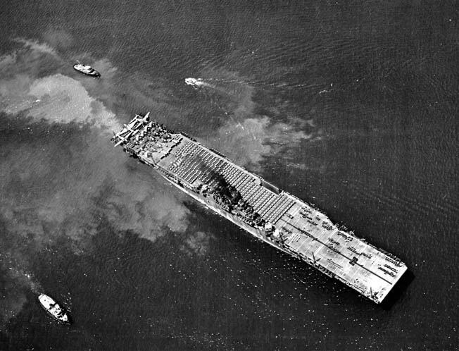 Ed Reynolds and Yorktown steam back into Pearl Harbor, Hawaii, for training and refitting, May 11, 1944. 