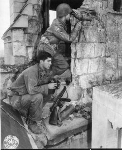 Soldiers of the 83rd Infantry Division occupy an observation post in France during the summer of 1944. Following the breakout from the hedgerow country of Normandy, that summer was one of tremendous gains and rapid movement.