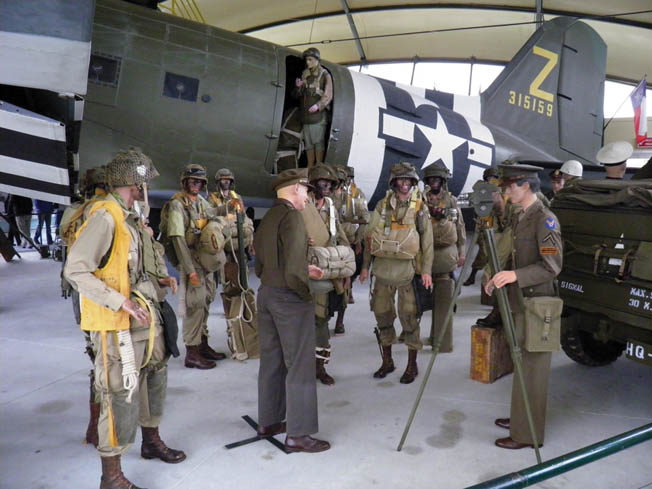 A mannequin of General Eisenhower chatting with 101st Airborne troops outside a C-47 transport plane is one of the highlights of the Airborne Museum at Ste.-Mère-Église. 