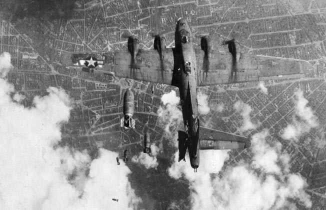 Even dropping bombs was dangerous. Here a B-17 has its left horizontal stabilizer sheared off by a bomb dropped from a plane above, May 19, 1944. The damaged B-17 plunged to earth killing all aboard. 