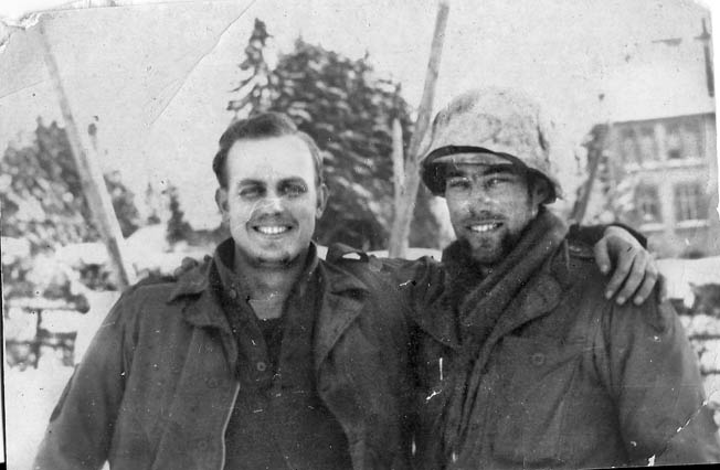 Pfc. Ralph Puhalovich (right) with a buddy in Bullingen, Belgium, January 1945—about the time he earned the Bronze Star Medal for valor.